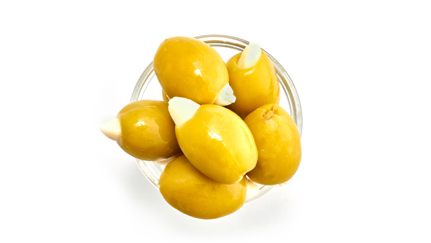 Olives vertes dénoyautés ,Amandes, Eau, Sel, Régulateurs d'acide ( acide lactique, acide citrique).