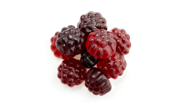 Glucose syrup*, Beet sugar*, Gelling agent (pectin), Acidity regulator (sodium tartrate, potassium ttartrate), Acidulant (citric acid), fruit juice concentrates* 1,75% (aronia* 0,7%, raspberry* 0,35%, black currant* 0,35%, bilberry* 0,35%), Natural flavours (raspberry, blueberry, blackberry, black currant), Colouring fruit and plant extract* (elderberry*), Caramel sugar syrup*, Coating agent* (carnauba wax*).*= Organic