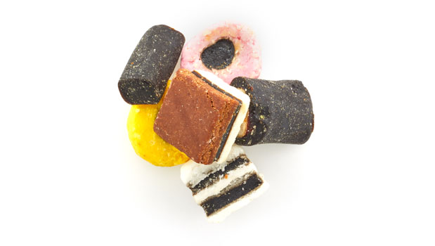 Sugar, treacle, enriched wheat flour, glucose syrup, desiccated coconut, vegetable oils (palm oil, coconut oil),  gelatine, cornflour, glycerol (humectant), colours (plain caramel, beetroot red, curcumin, paprika extract), cocoa powder, liquorice extract, glazing agent (beeswax), flavourings, spirulina concentrate, fruit and vegetable concentrates (blackcurrant, carrot).